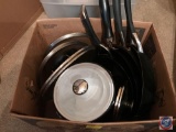 Box containing Circulon pans and lids
