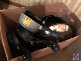 Box containing sauce pans, skillets, and assorted lids
