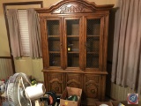 Lighted buffet with glass shelves