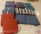 (9) Decorative Seat Cushions of Varying Colors and Sizes