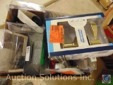 Box containing packages of door knob and lock hadware