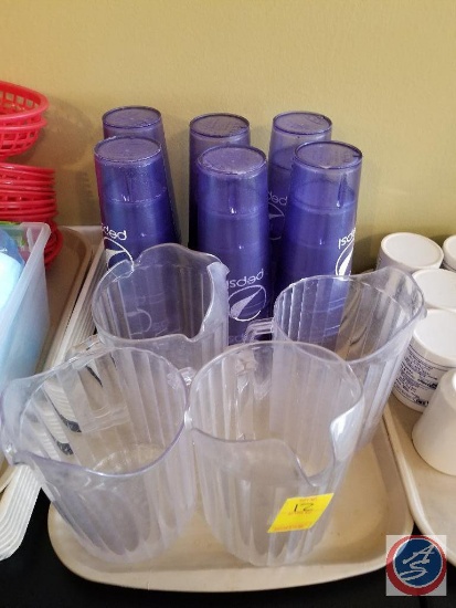 Tray containing (4) plastic water pitchers, Pepsi plastic cups, and more