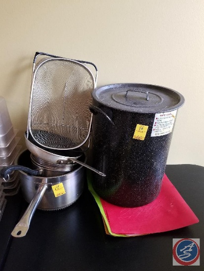 Large stock pot with lid, strainer, and assorted pots and pans