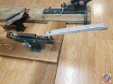 (2) Trius Trap skeet/trap throwers, both mounted for stability, (1) thrower for parts (missing