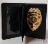 Black concealed weapon wallet and badge