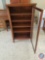 Antique 5 shelf wood cabinet with glass door on casters (no key)- 53.5