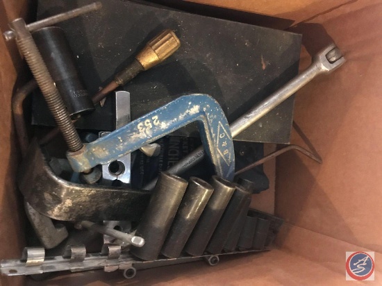 Box of assorted tools including deep well sockets, steering wheel puller, T-handle allen wrenches