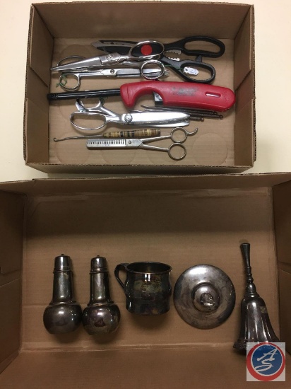 Flat containing a sliver plate, cup, salt and pepper shakers, a bell, sissors, shears, a Bic lighter