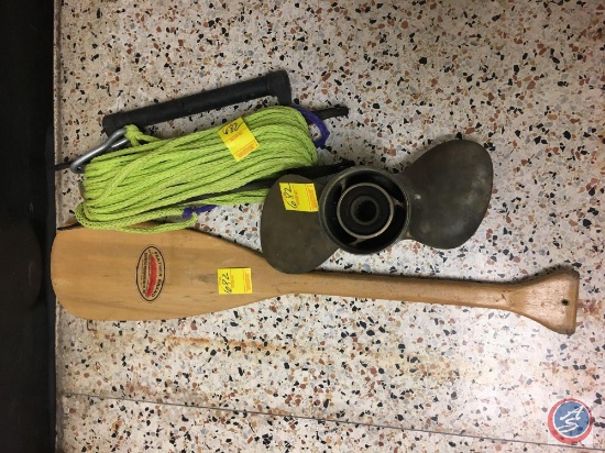 Propeller, ski rope and a Feather brand oar