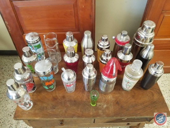 Assorted glass, plastic and metal bar shakers including a vintage Sparklet Devices Seltzer bottle