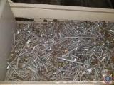 Contents of Shelf Containing Assorted Screws and Nails