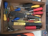 Flat containing claw hammer, screwdrivers, and bowie knife with sheath