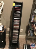 Assorted CD's and the tower they are stored in appx 40