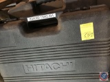 Hitachi 14 volt drill driver box, containing a flash light