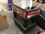 Coca Cola beverage cooler on wheels with sink sprayer faucet