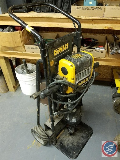 DeWalt pavement breaker #D25980 type 1, with dolly and (5) attachments included.