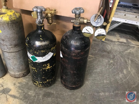 Two Nitrogen bottles with regulators. Please note : Pick Up for these items will be one day only in