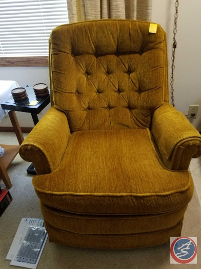 Upholstered rocking swivel chair