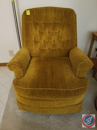 Upholstered rocking swivel chair