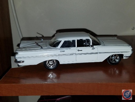 White model 2 door Impala