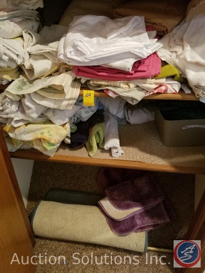Assorted Linens, Towels, and Mats-Lower 3 Shelves