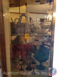 Contents of Top 2 Shelves of Display Cabinet to Include Glass Vases, Glass Purse, Pitcher and 2