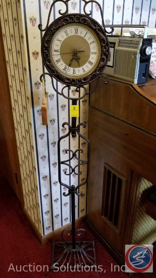 Wrought Iron Standing Floor Clock w/ Wooden Sign measuring 53 inches in height
