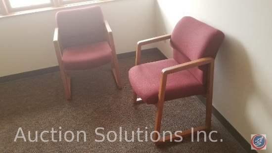 5 foot oak desk, 4 foot lateral file cabinet and two red office chairs.