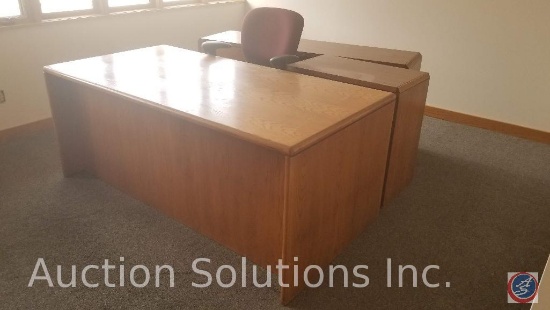 6 foot oak finish desk with return, 4 foot two drawer lateral file cabinets and a 6 foot credenza