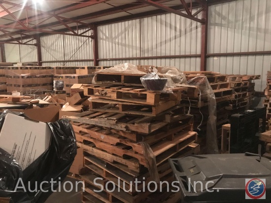 Approximately 100 wooden pallets in various condition.