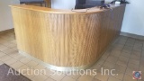 Front office reception desk approximately 105 x 57 x 42 inches tall made of oak