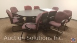 8 foot conference room table, 4 rolling executive chairs six arm chairs and a dry erase board