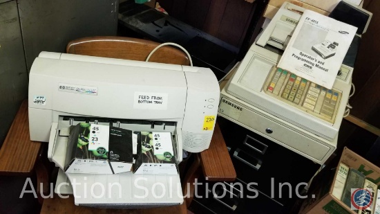 Hewlett Packard DeskJet 1120C printer w/ ink cartridges; and a Samsung ER-4915 electronic cash