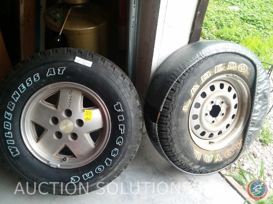 Uniroyal Larado tire (P235/75R15M+S) and Firestone Wilderness AT tire (P235/75R15 105S M/S