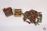 Assorted vintage shot gun shells and western 38 caliber cartridge box