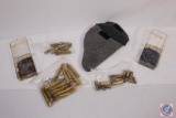 (2) boxes of 17cal. bullets, assorted brass, pistol rug