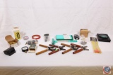 (4) bullet molds, Pressure guage, magnifyer, pistol cleaning rod, bullet puller, RCBS case lube pad