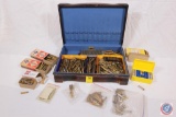 Wooden box containing assorted calibers of empty brass and some live rounds
