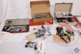 Box containing large lot of small firearms parts including recoil springs, bolts, feed tubes, sites,