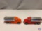 (2) Die cast cars: HOT WHEELS red unolocal 76 gas truck, HOT WHEELS orange unolocal 76 gas truck.