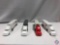 (4) Die cast cars: ROAD CHAMPS red ford white trailer sea land, ROAD CHAMPS white ford white trailer