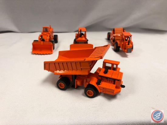 Die cast car: (4) THE ERTL Co. construction trucks.