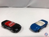 (2) Die cast cars: MATCHBOX black with red interior 3000 GT spyder, MATCHBOX candy blue Mitsubishi
