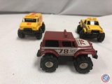 (3) STOMPER yellow w/ orange stripes 4x4 Chevy stomper, STOMPER Chevy 5-10 4wd, STOMPER 4x4 Jeep