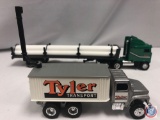 (2) Die cast cars: ERTL silver Tyler transport truck w/ grain feeder, ERTL green Tyler transport