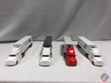 (4) Die cast cars: ROAD CHAMPS red ford white trailer sea land, ROAD CHAMPS white ford white trailer
