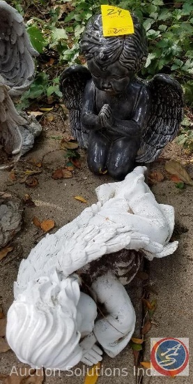 Gray ceramic angel and white resin sleeping angel