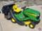 John Deere X300 riding lawn mower with 42