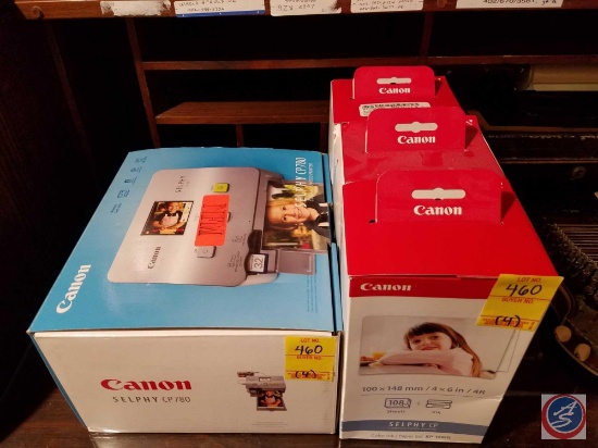 Canon Selphy compact photo printer (model #CP780), (3) boxes of Canon photo paper