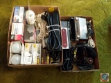 (2) boxes containing; light bulbs, electrical cords, Sony walkman, Copal alarm clock, GE AM/FM
